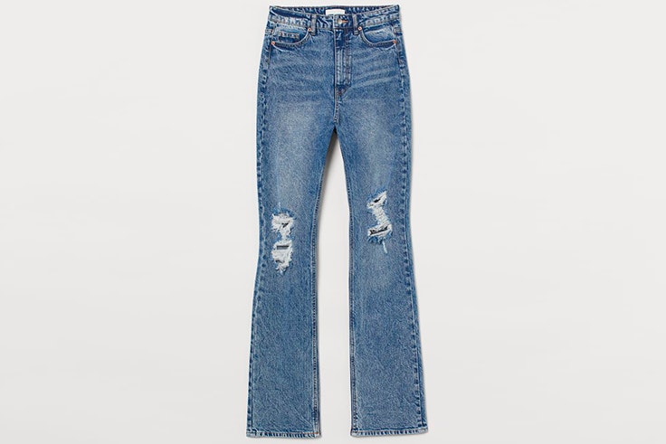 Pantalones vaqueros con detalles desgastados de H&M