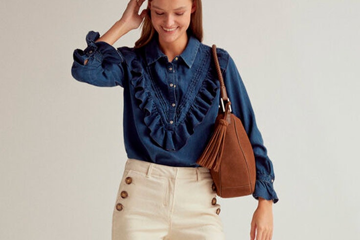 Camisa vaquera con volantes de Cortefiel